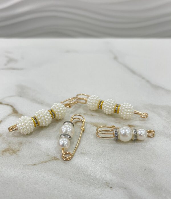 Prendedor Shein con perlas