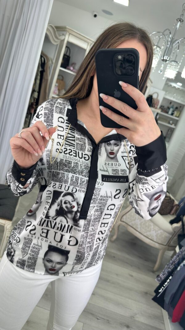 Blusa Guess estampa periódico