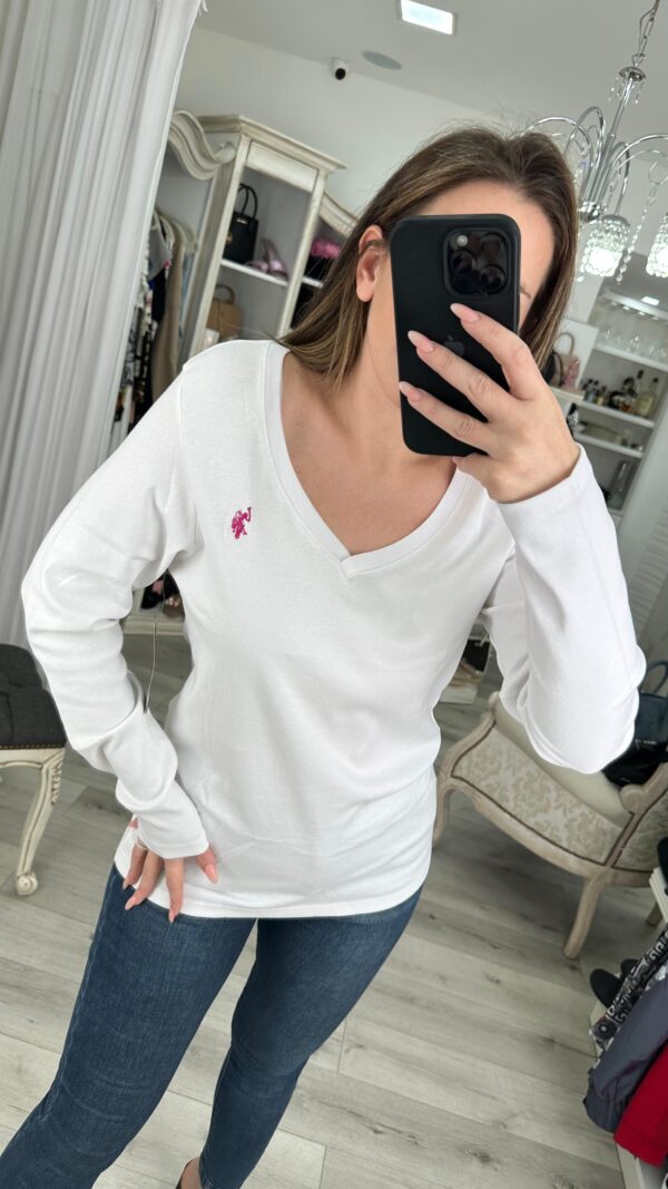 Remera Polo escote V manga larga