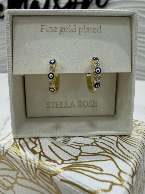 Aros Stella Rose dorados con ojitos turco