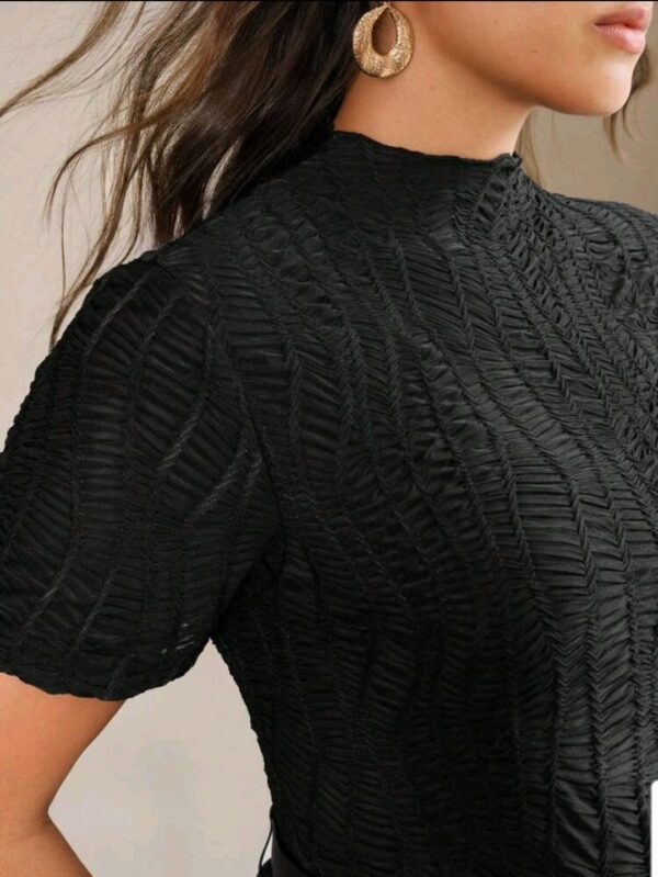Media polera Anewsta negra labrada manga corta - Imagen 2