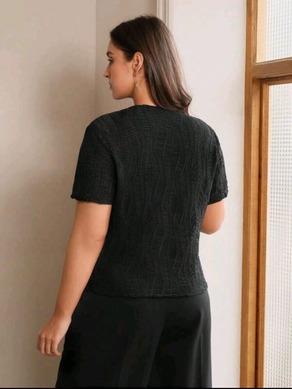 Media polera Anewsta negra labrada manga corta - Imagen 4